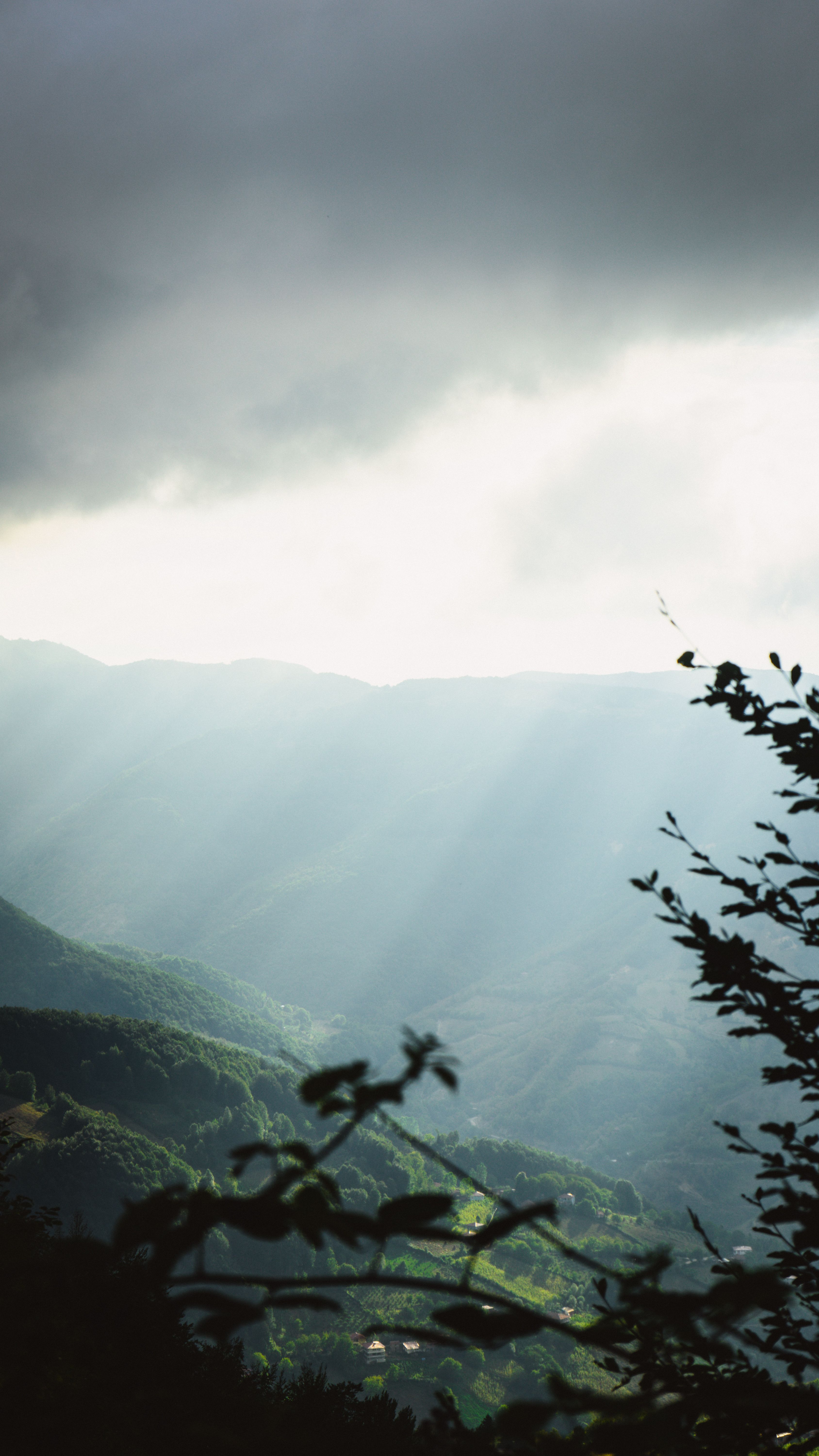 Sun Rays Breaking Through Clouds Over A Lush Valley In Erbaa, Tokat, Türkiye.
