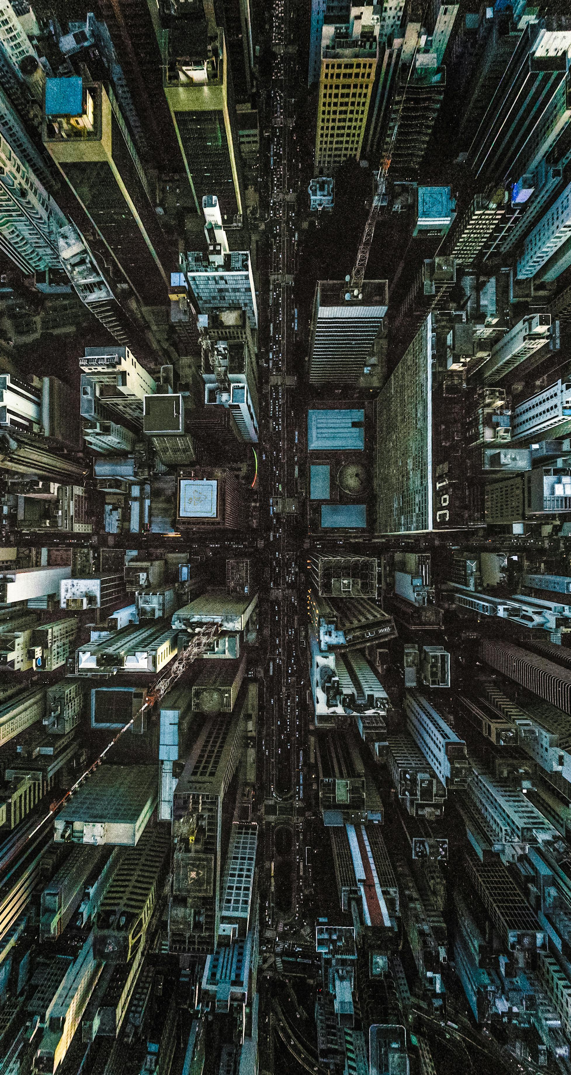A Breathtaking Aerial Perspective Of A Dense Urban Cityscape Showcasing Towering Skyscrapers And Bustling Streets.