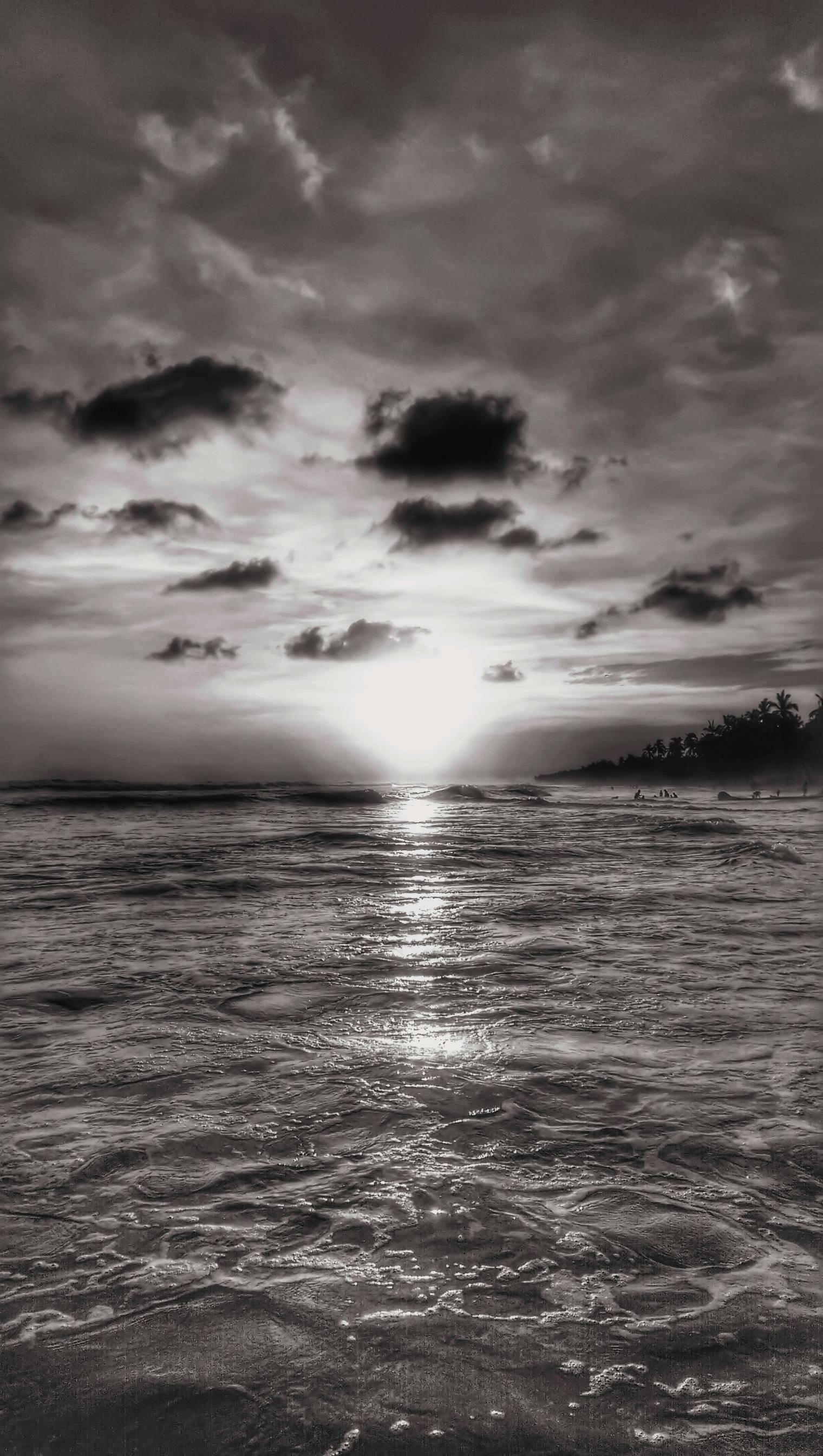 Captivating Black And White Sunset Over The Ocean In Lázaro Cárdenas, Mexico.
