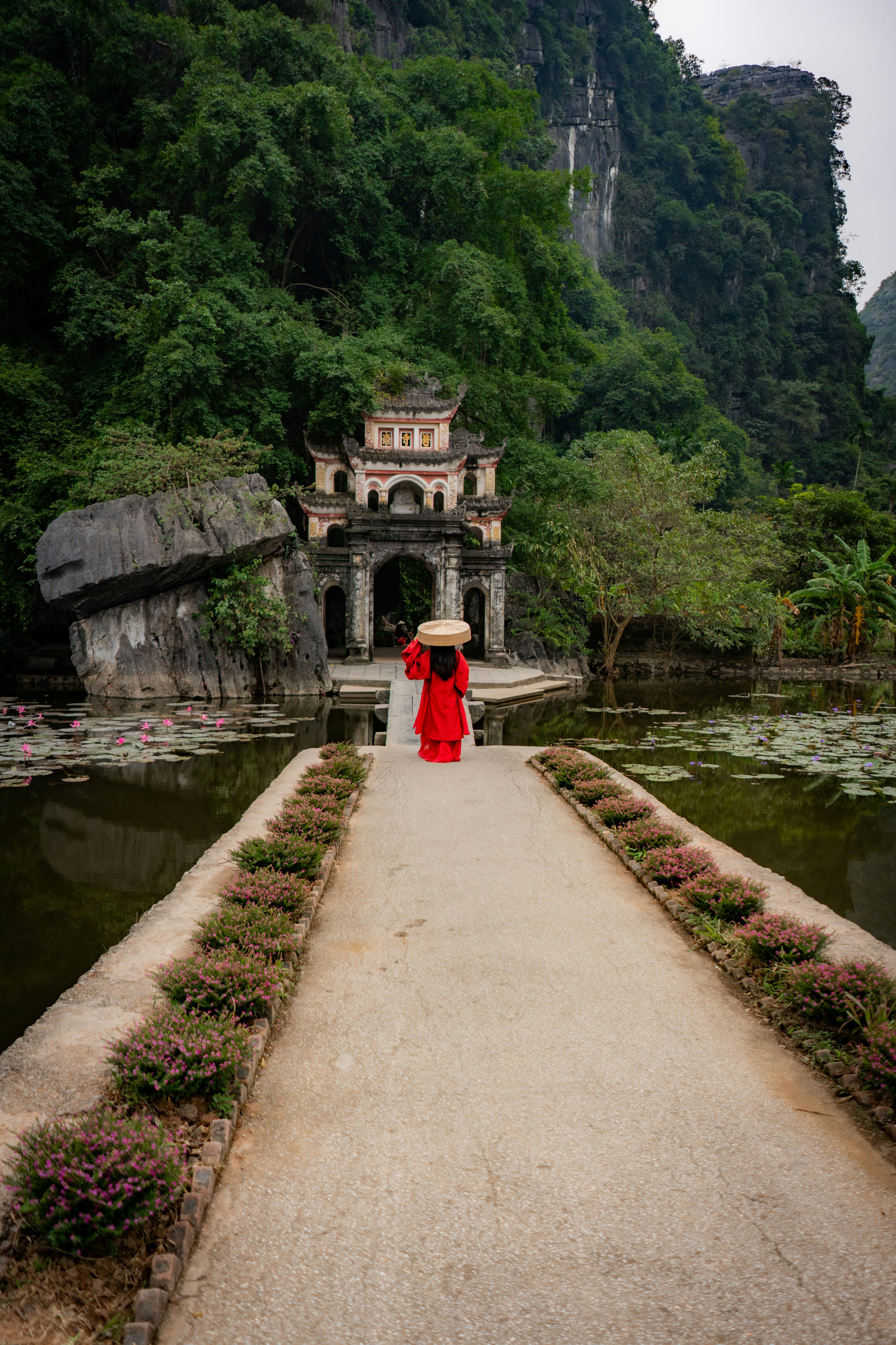 Woman In Front Of Temple In Ninh Binh