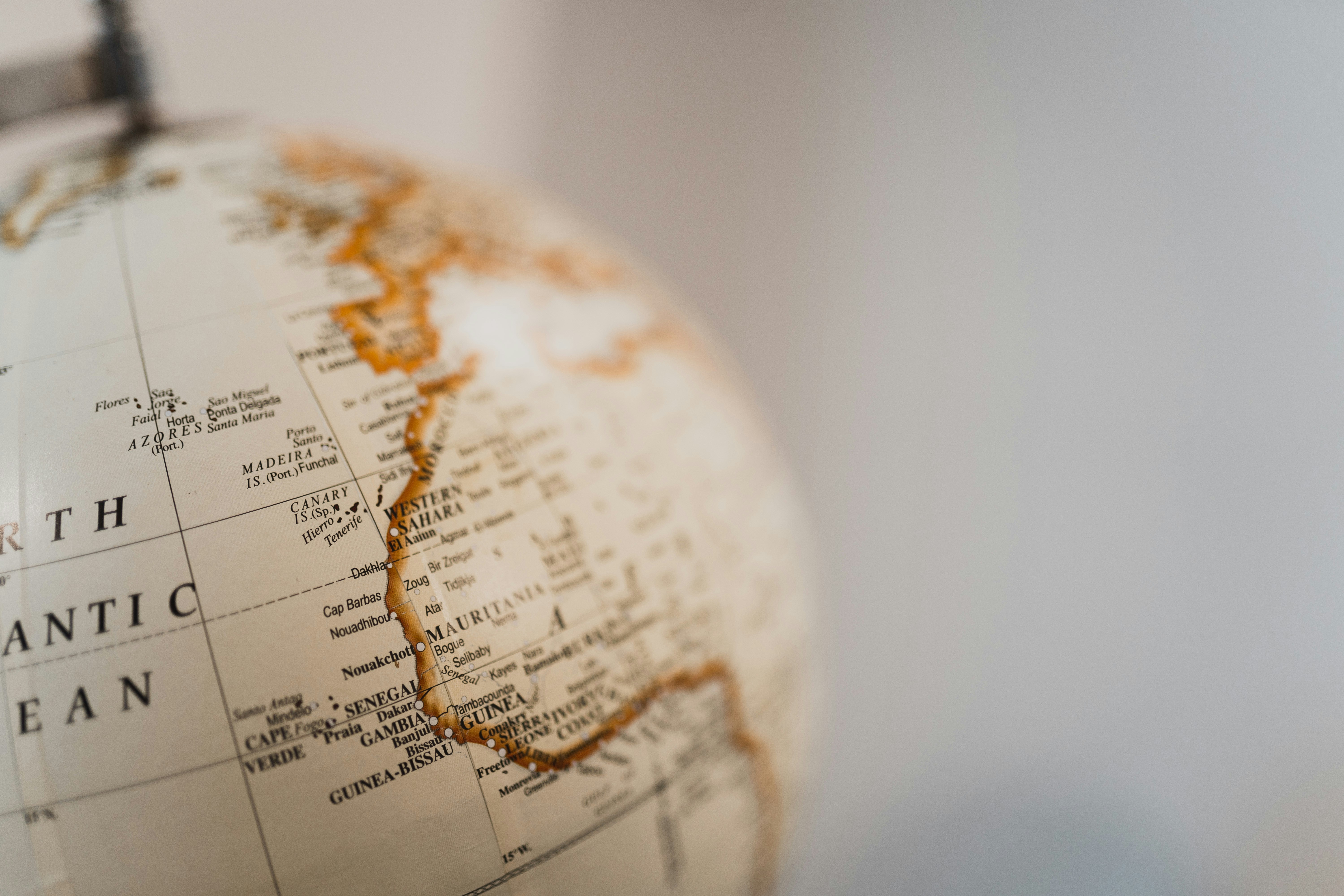 A Vintage Globe Showing The North Atlantic Ocean And Continents.