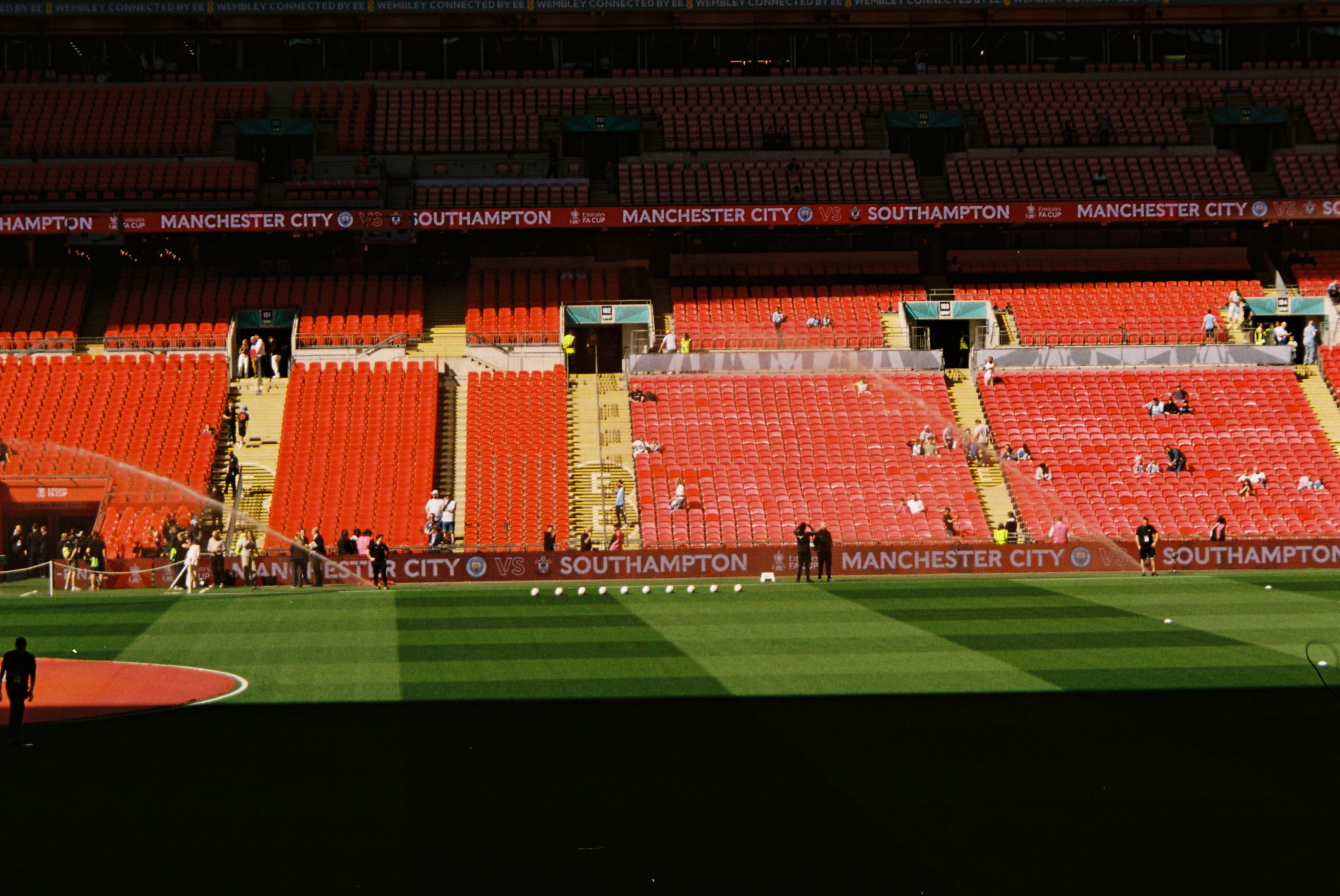 Empty Stadium Seating With A Soccer Field Below HD mobile wallpaper