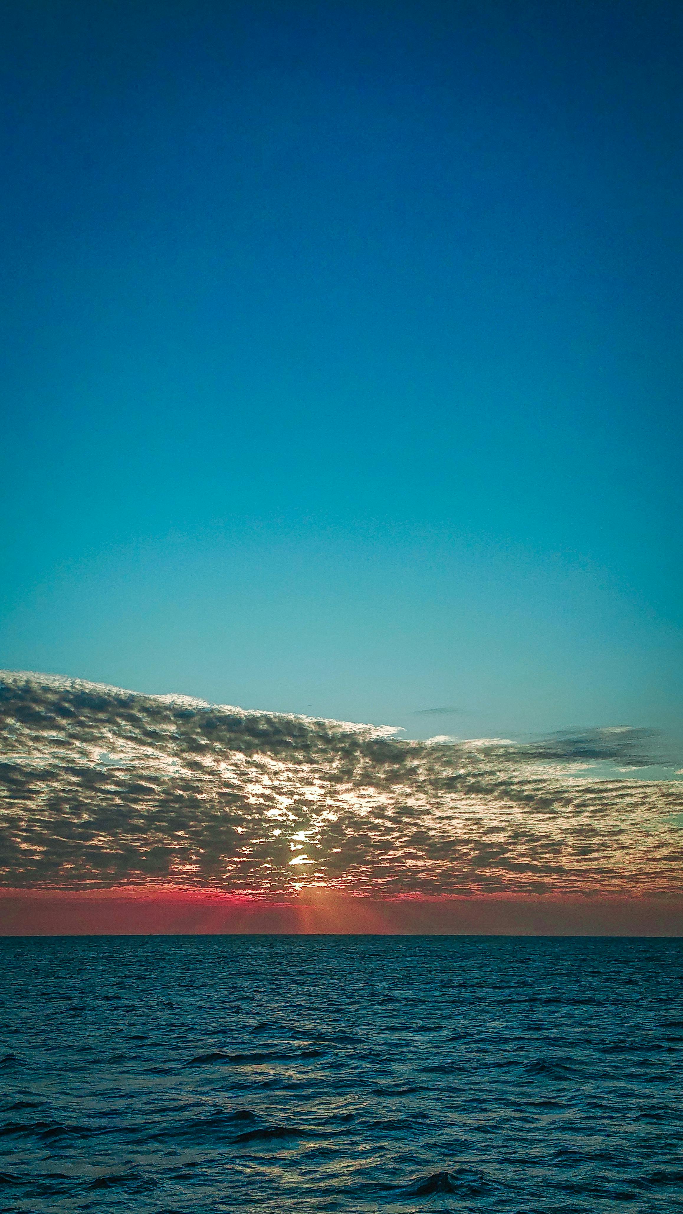 赞齐巴尔夕阳天空海洋静谧美景手机壁纸高清图片