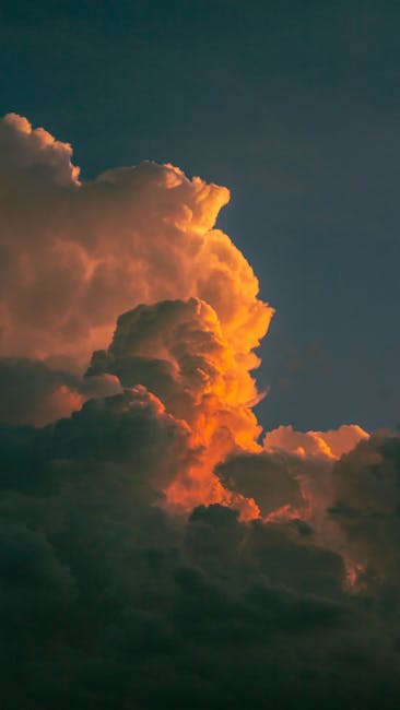 A Stunning Image Of Dramatic Sunset Clouds With A Beautiful Play Of Light And Shadow, Highlighting The Cloud Formations. wallpaper preview