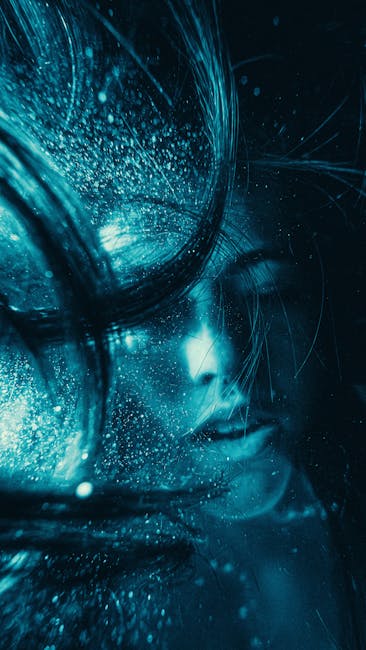 Surreal Underwater Portrait With Blue Hues And Flowing Hair, Creating A Mystical Effect. wallpaper preview