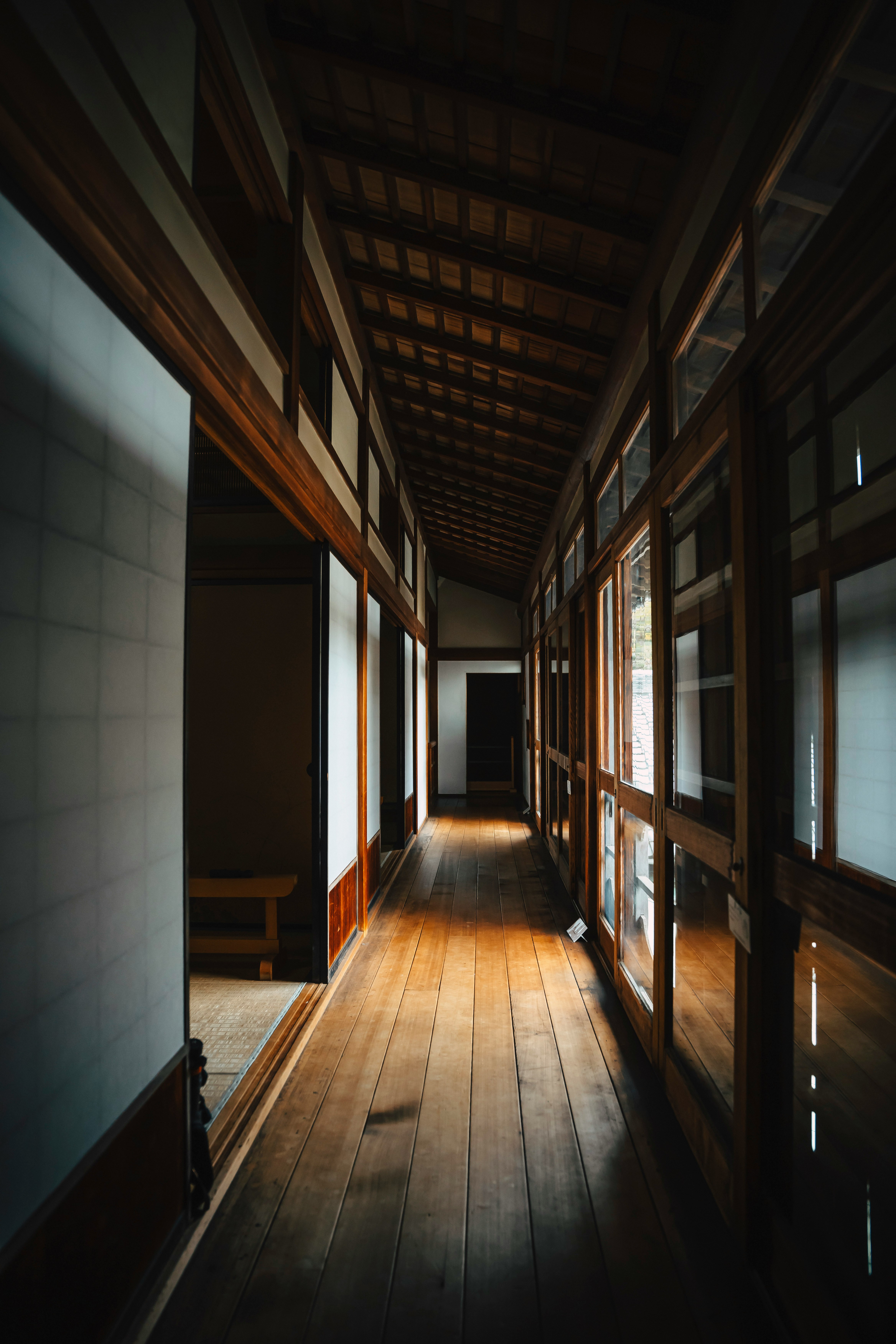 Sunlight Streams Down A Wooden Hallway In An Old Building. HD mobile wallpaper