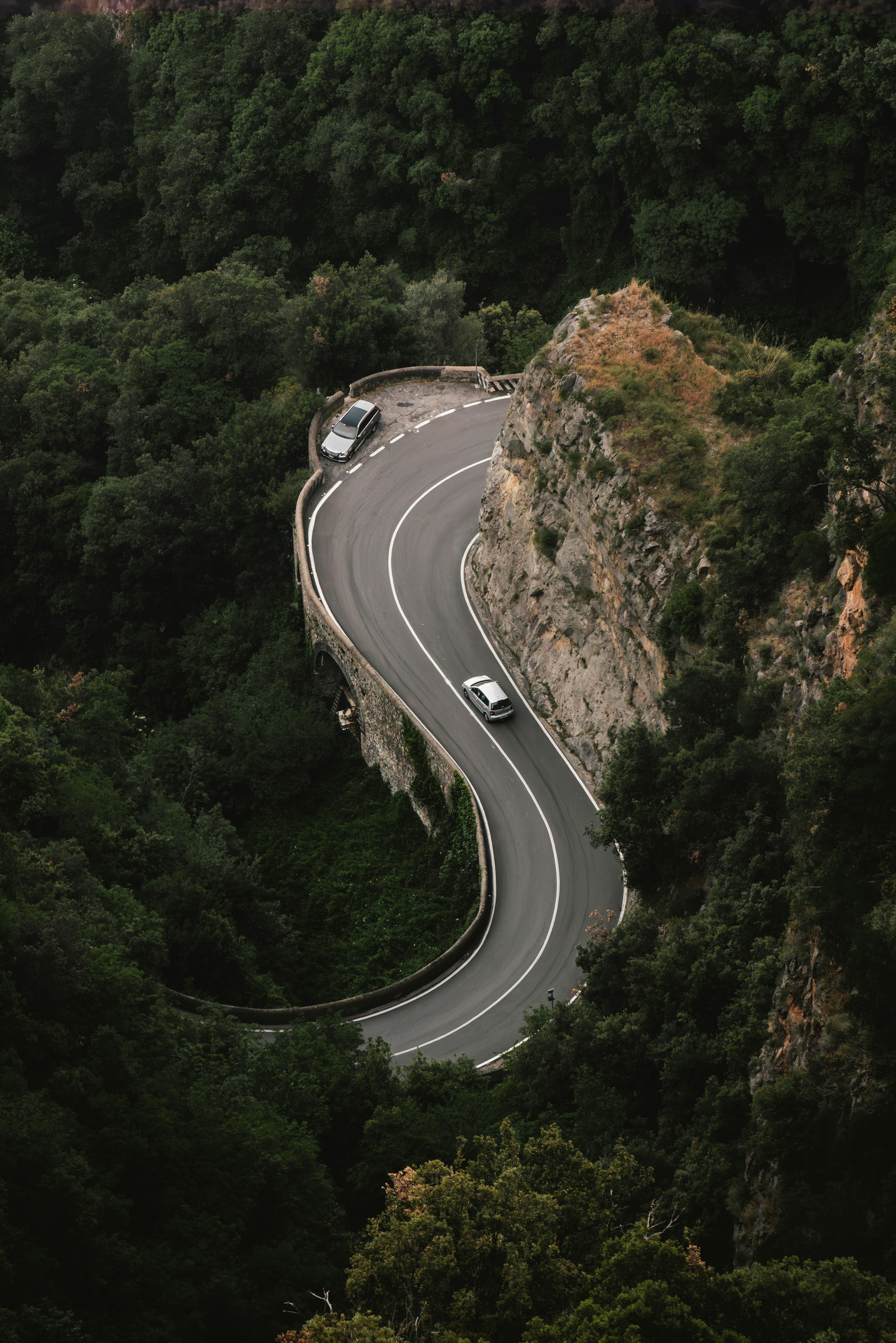 Cars Navigating A Curvy Amalfi Coast Road HD mobile wallpaper