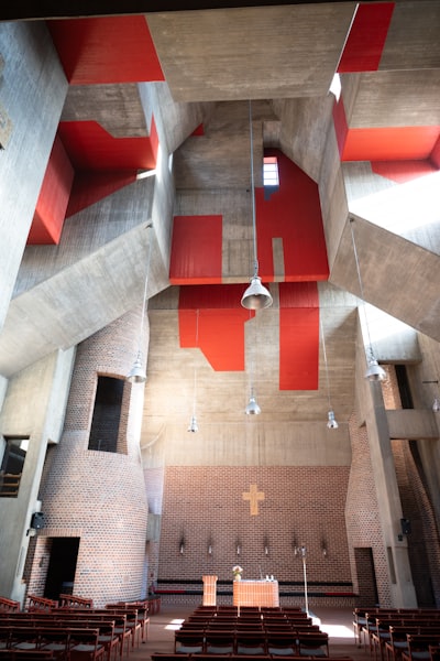 Modern Church Interior With Concrete And Red Accents wallpaper preview