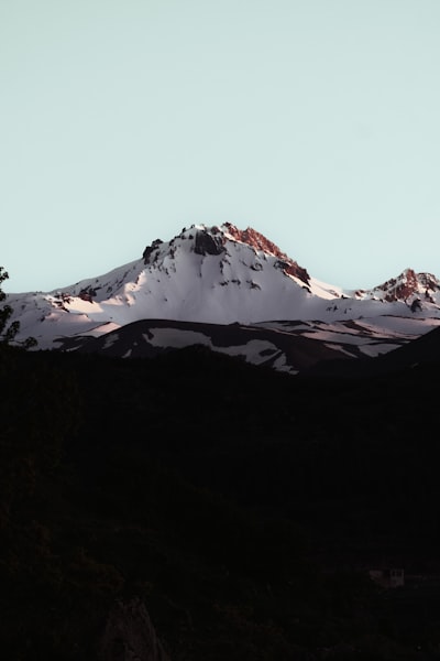 Snow-capped Mountain Peak Under A Clear Sky. wallpaper preview