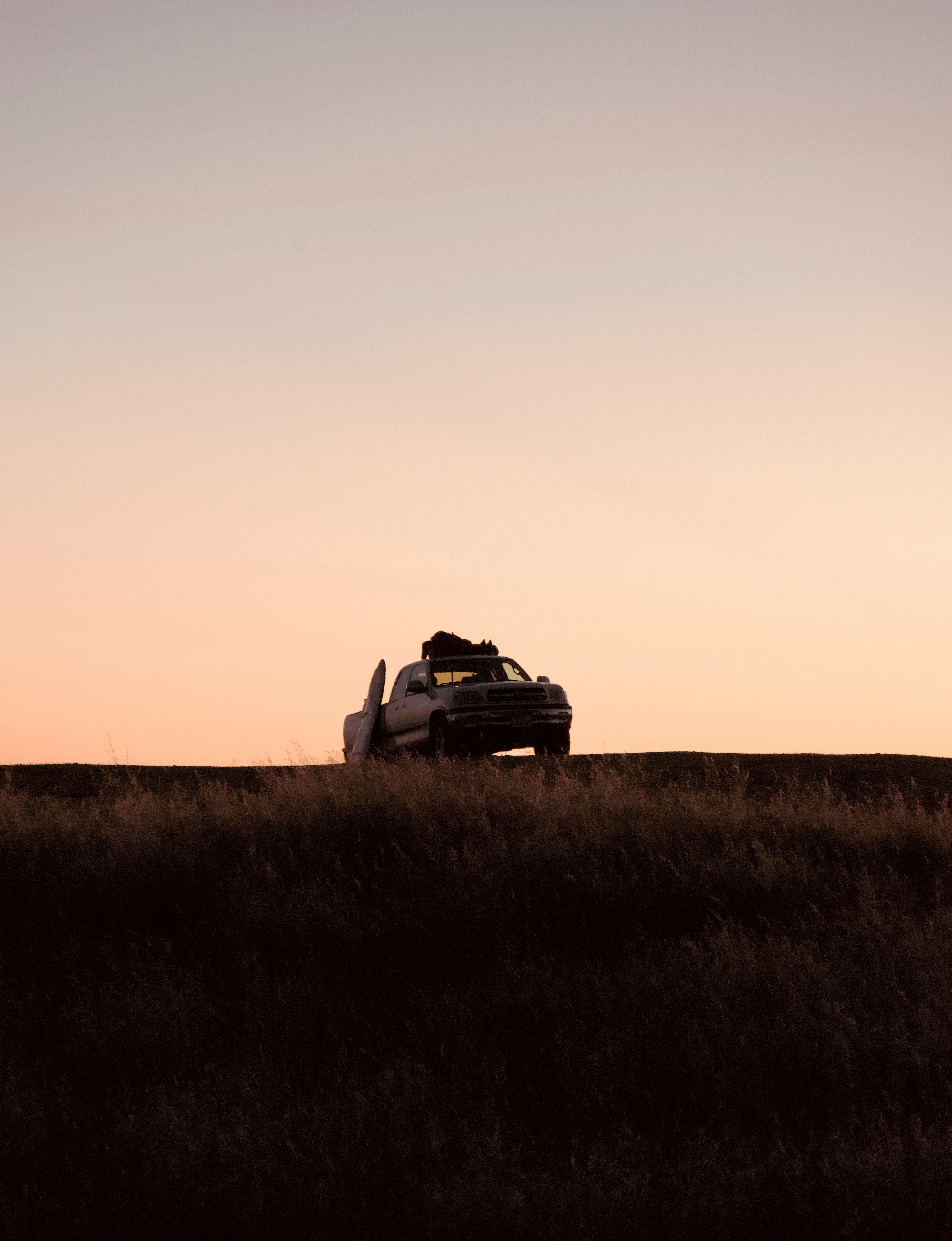 Pickup Truck Silhouette Against A Vibrant Sunset Sky. HD mobile wallpaper