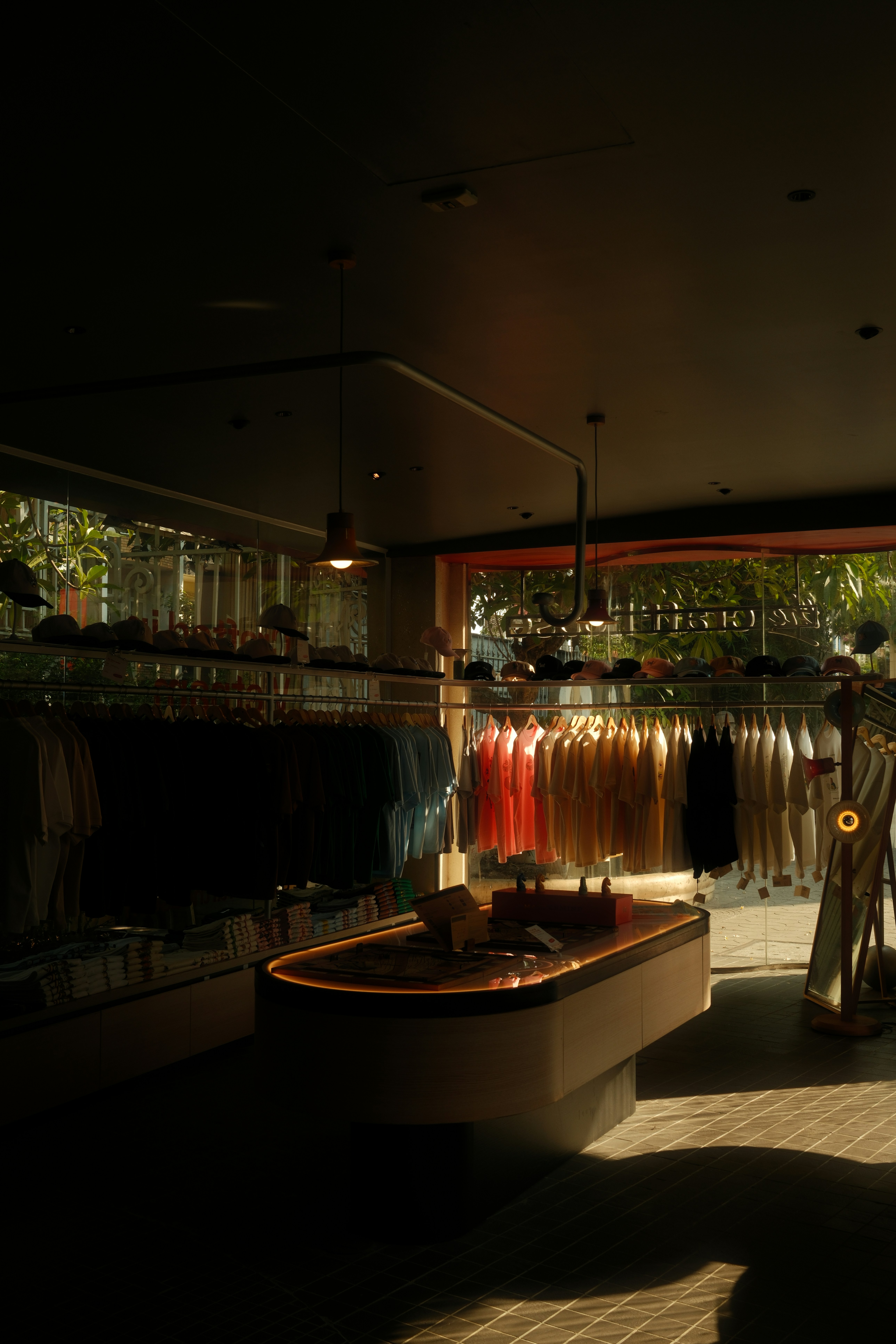 Clothing Store Interior With Racks Of Apparel. HD mobile wallpaper