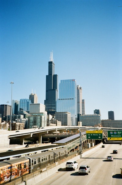 City Skyline With Skyscrapers, Highway, And Train. wallpaper preview