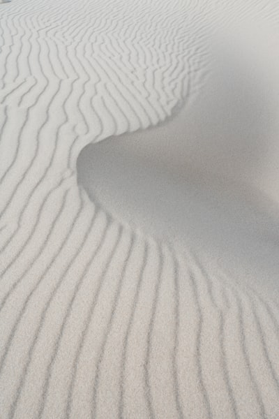 Textured Sand Dunes With Intricate Ripple Patterns. wallpaper preview
