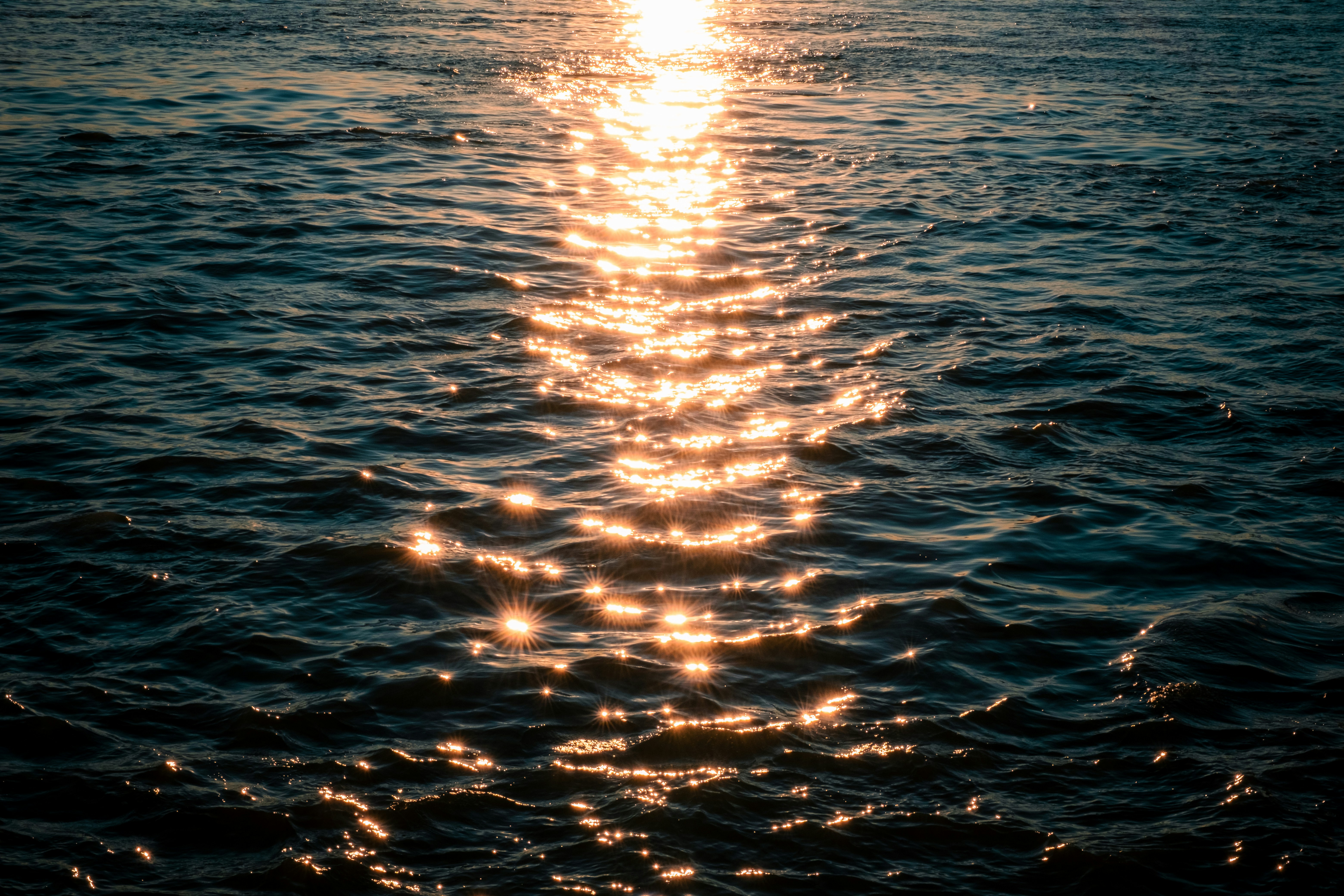 Sunlight Path Reflecting On Dark, Rippling Ocean Water At Sunset. HD mobile wallpaper