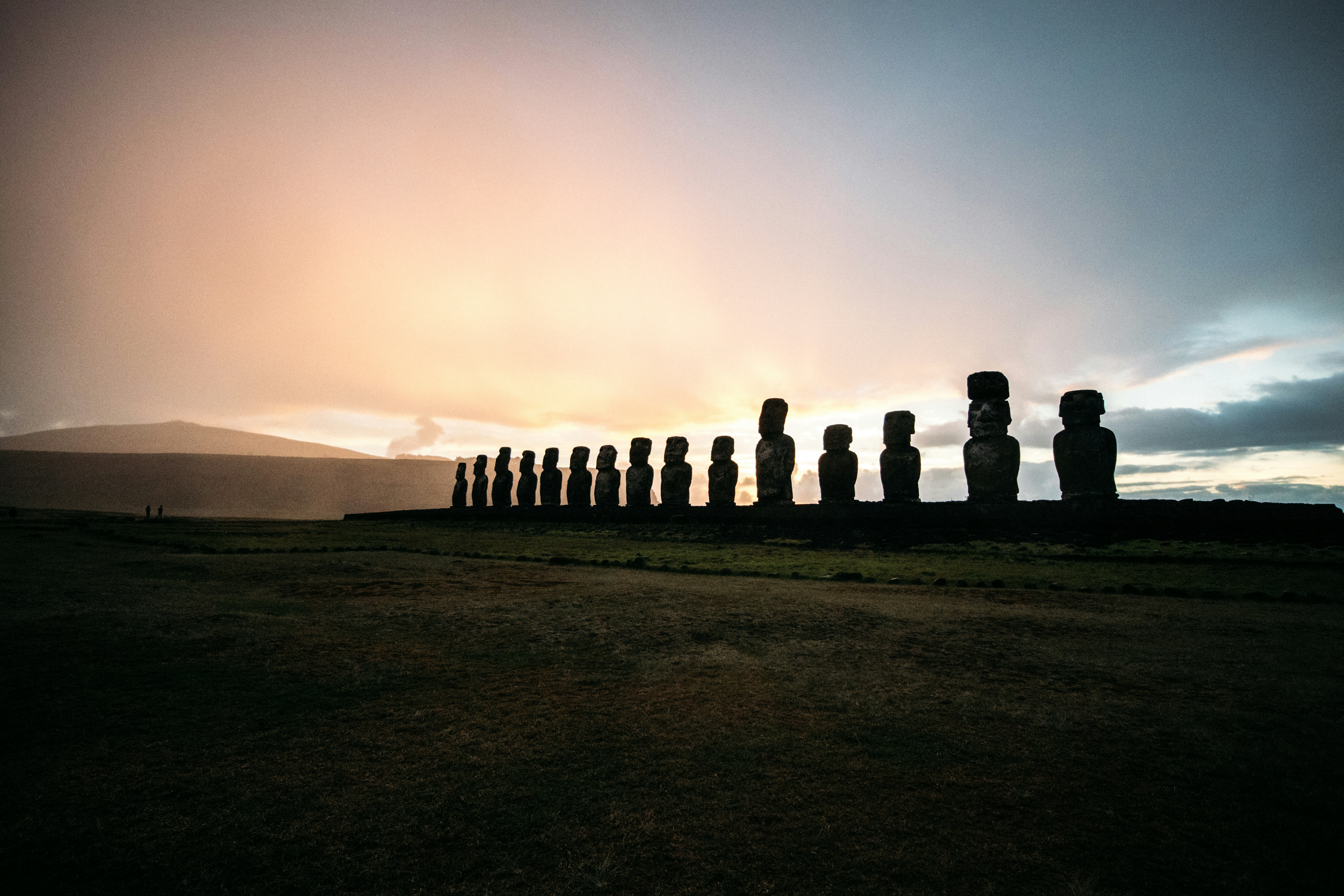 Ancient Moai Statues Silhouetted At Sunset On Easter Island. HD mobile wallpaper