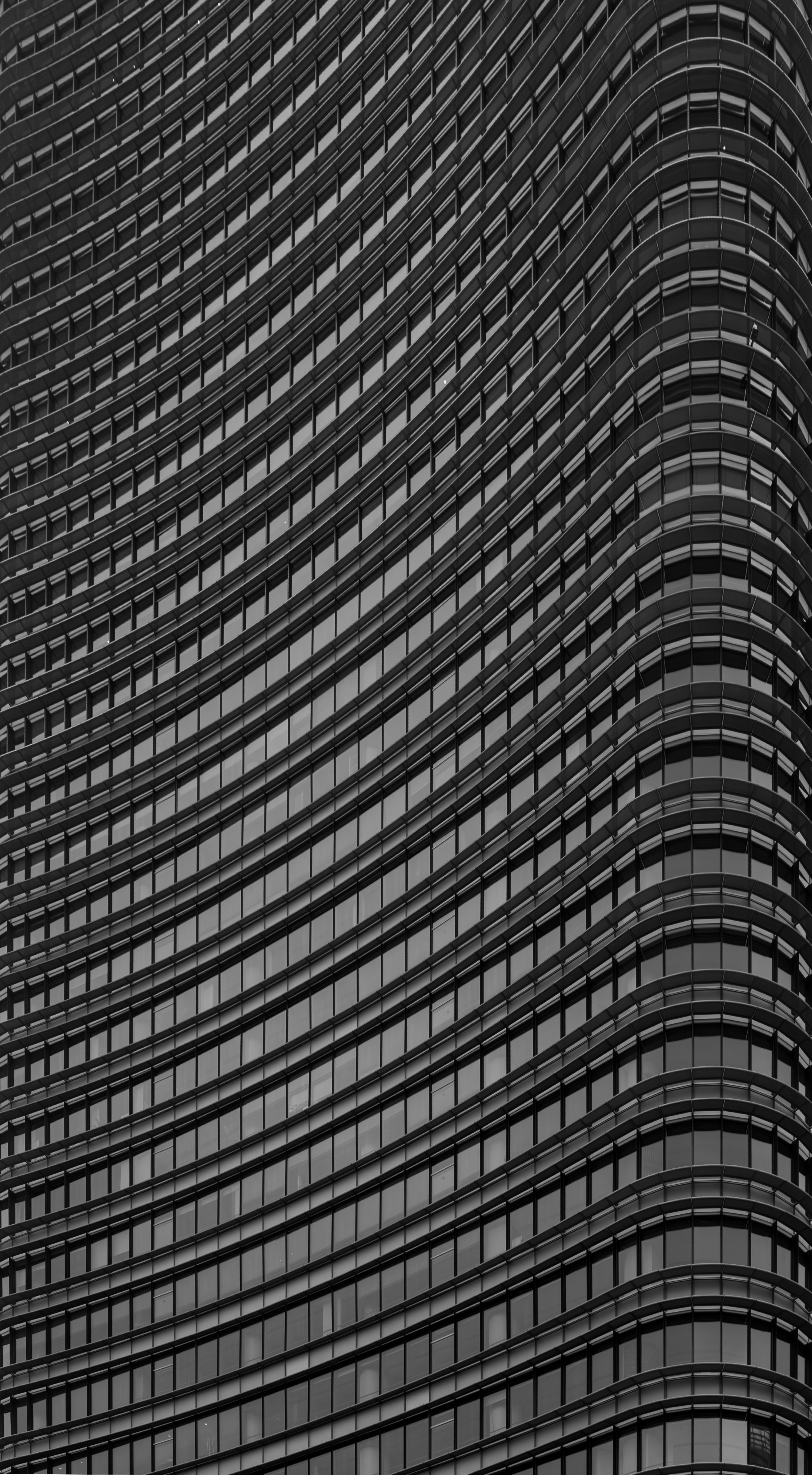 Monochromatic Building Facade With Undulating Lines HD mobile wallpaper