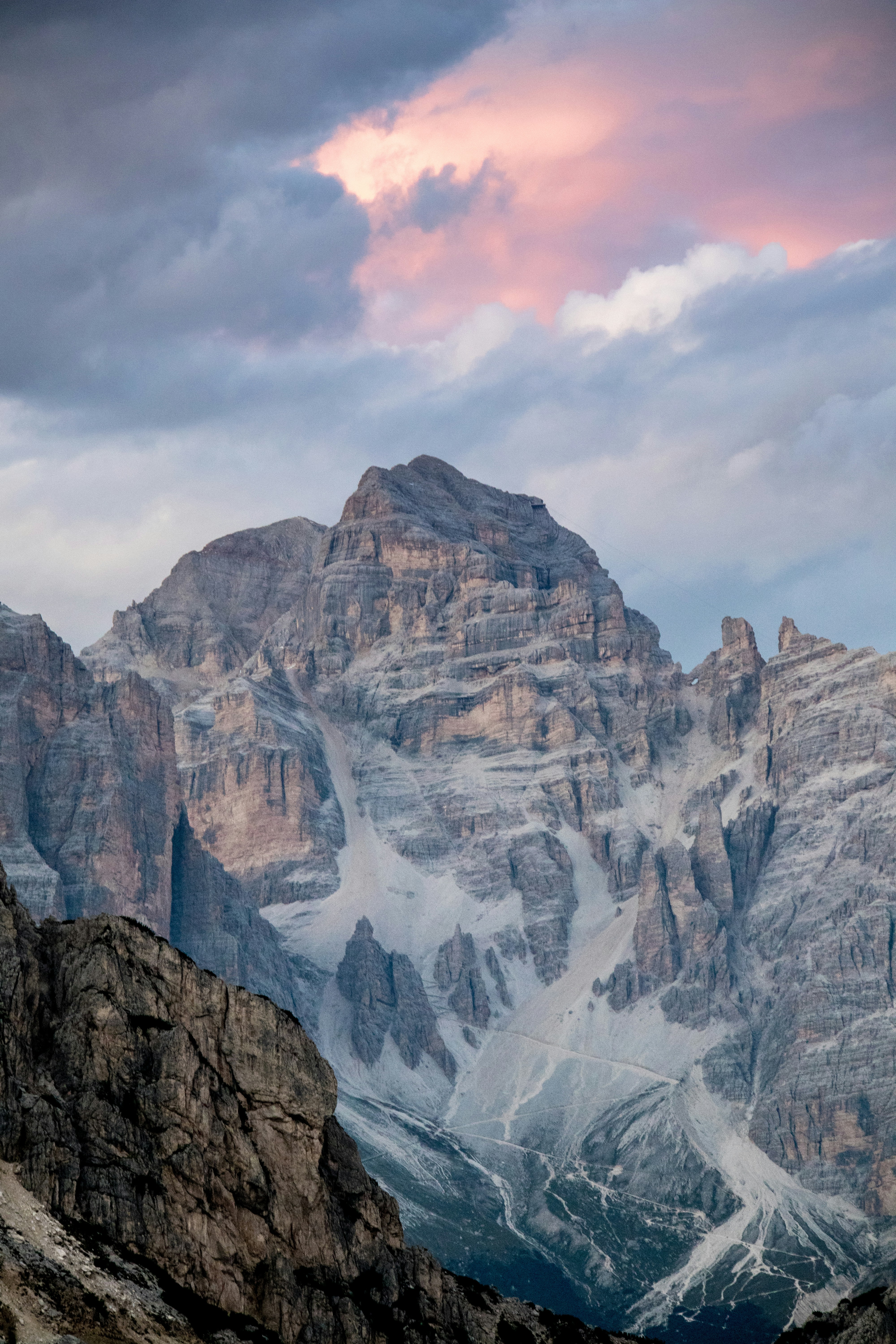 Majestic Mountain Peak Under A Dramatic Sky With Pink Clouds. HD mobile wallpaper