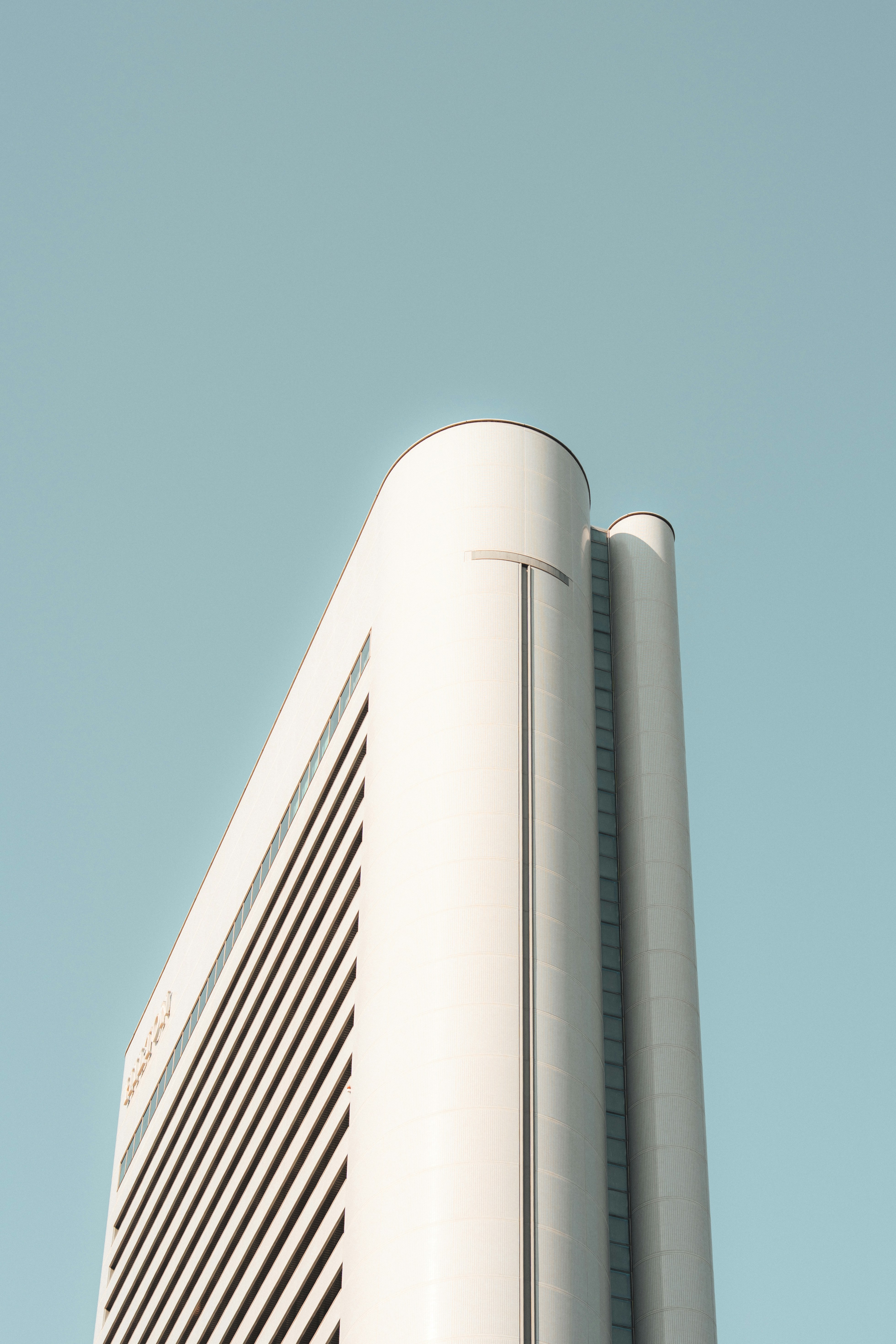 Modern White Building Against A Clear Blue Sky. HD mobile wallpaper