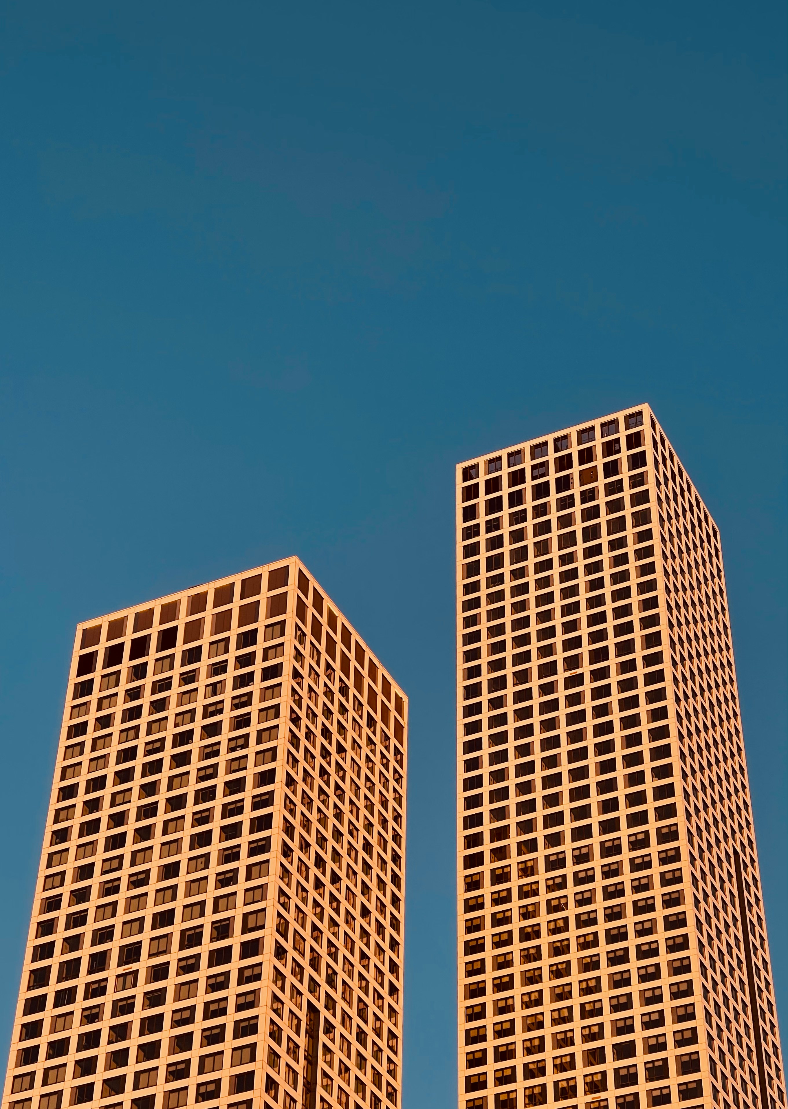 Brown Concrete Building Under Blue Sky During Daytime
