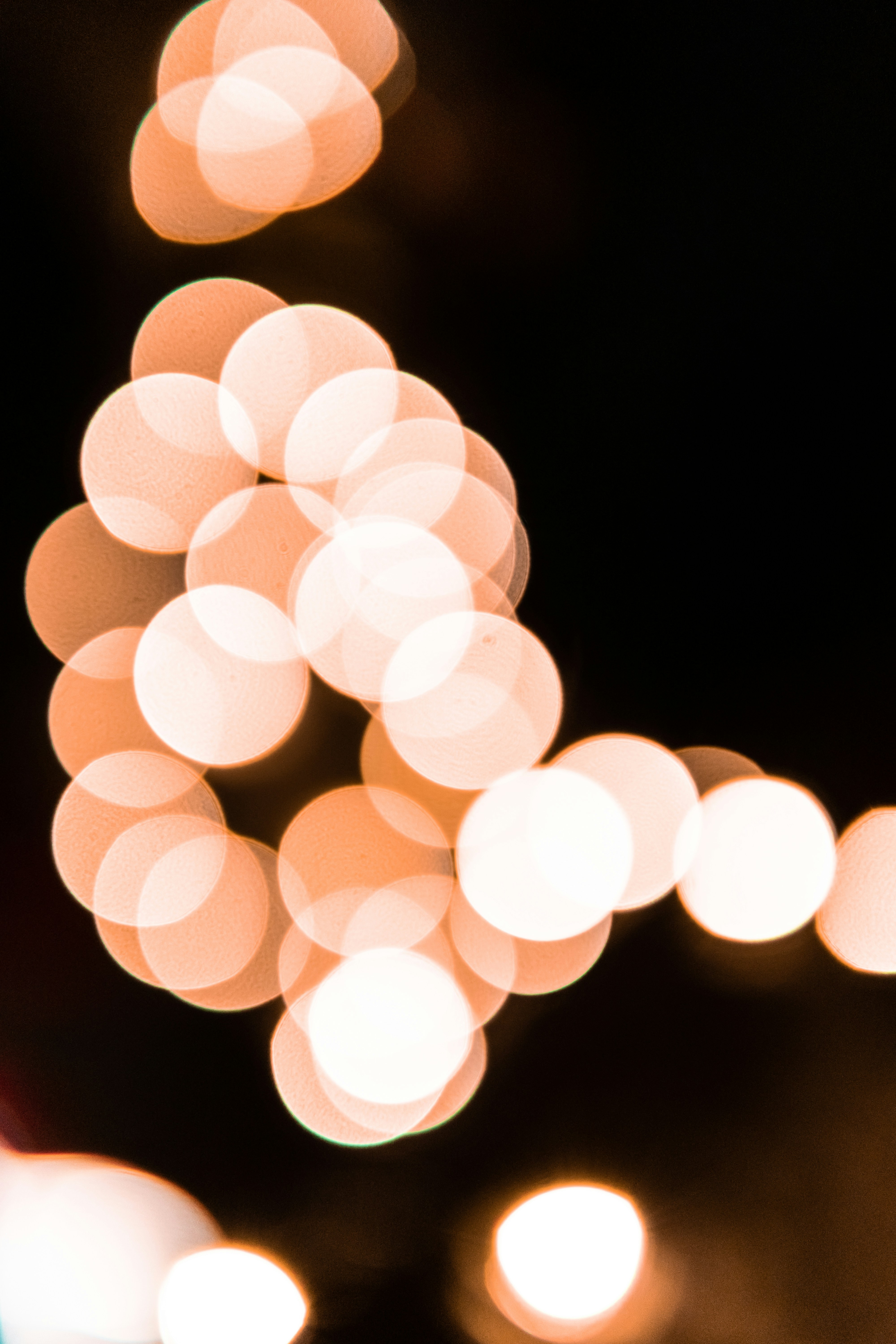A Blurry Photo Of A Street Light At Night